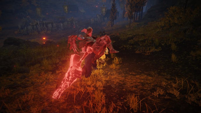 Elden Ring player leaping into the air and swinging a fiery black blade around behind their back, about to slam into the ground.