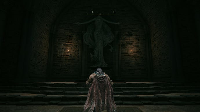 The player in Elden Ring: Shadow Of The Erdtree performs the O Mother gesture in front of a statue of Marika.